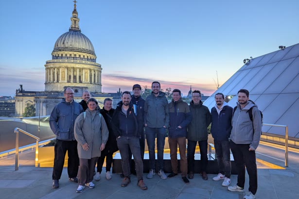 The Private Packagist team on a rooftop in front of St Paul's Cathedral in London